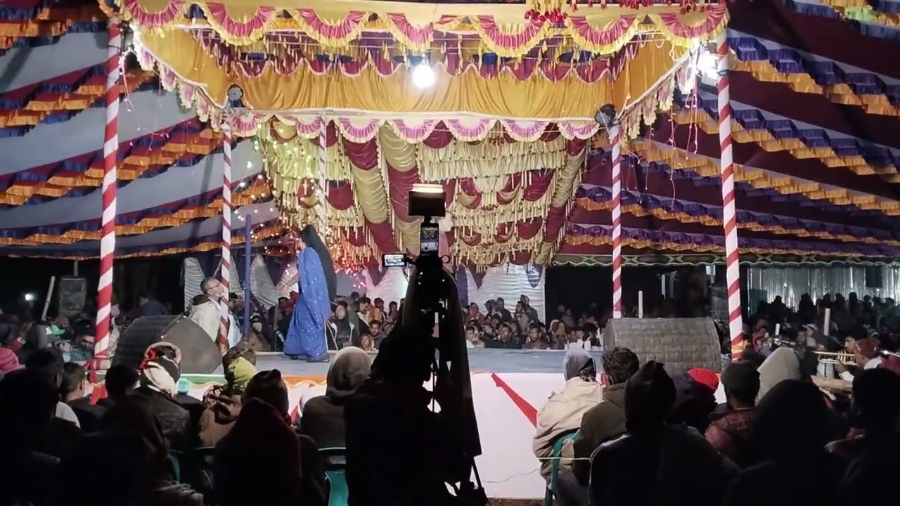 ঝুমুর ঝুমুর যাত্রাপালা বইটির নাম হচ্ছে গরিবের ছেলে