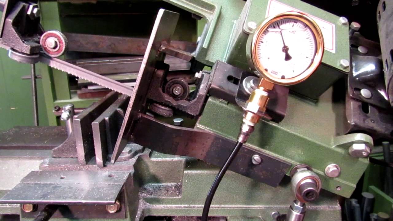 Harbor Freight 4x6 bandsaw shop made lowering hydraulic cylinder and valve