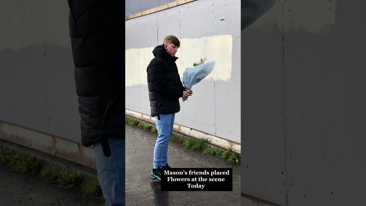 Flowers and tributes at the scene on Belfast's Shankill Road