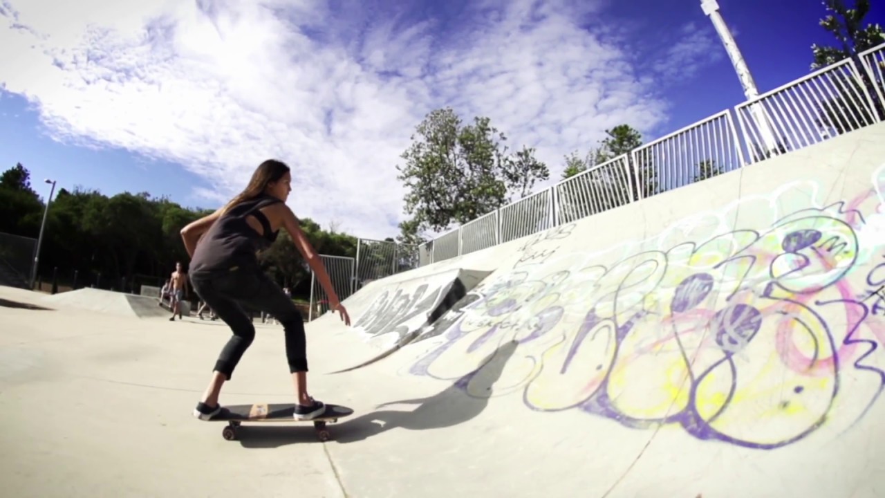 Surfer Skater Girl Sabina on her Surf Skate SmoothStar