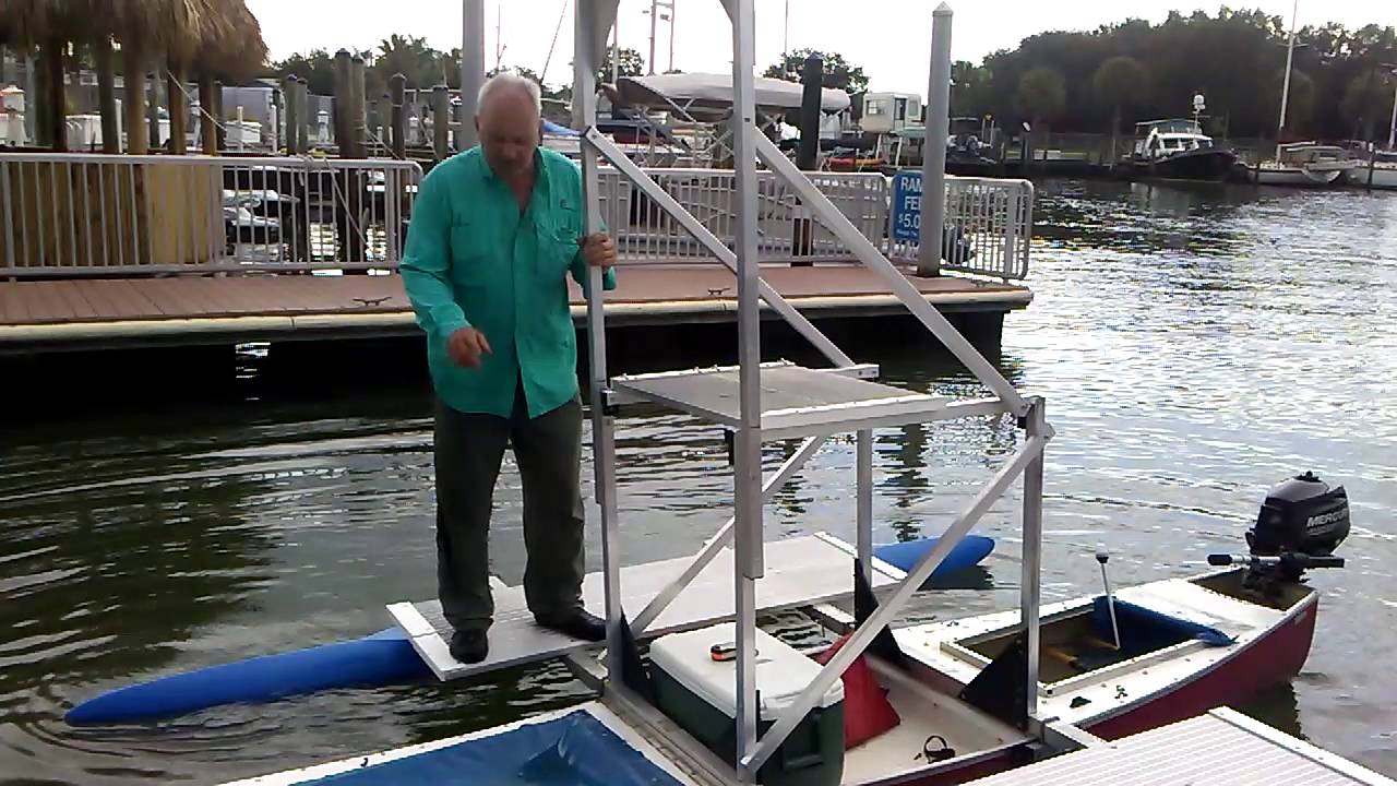 Fishing outrigger canoe with tower