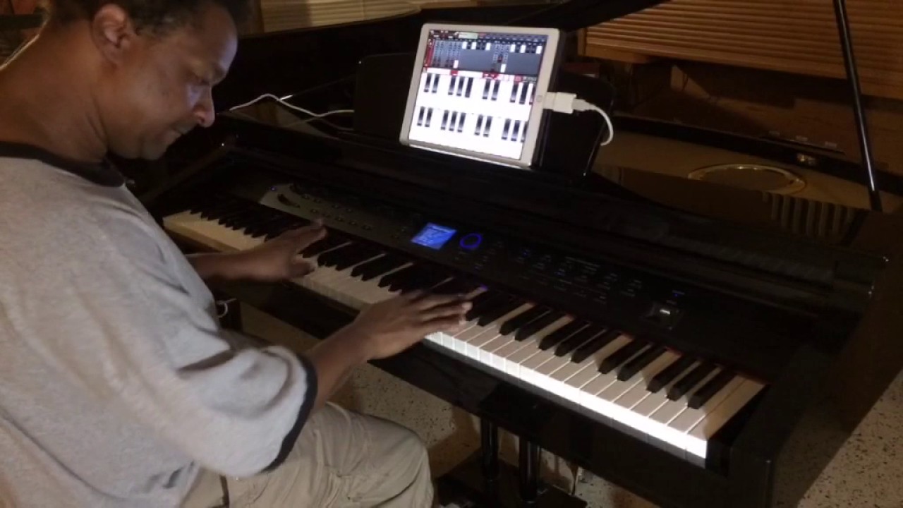 Kris Nicholson shows how to hook up a iPad to the Williams Symphony Grand Digital piano