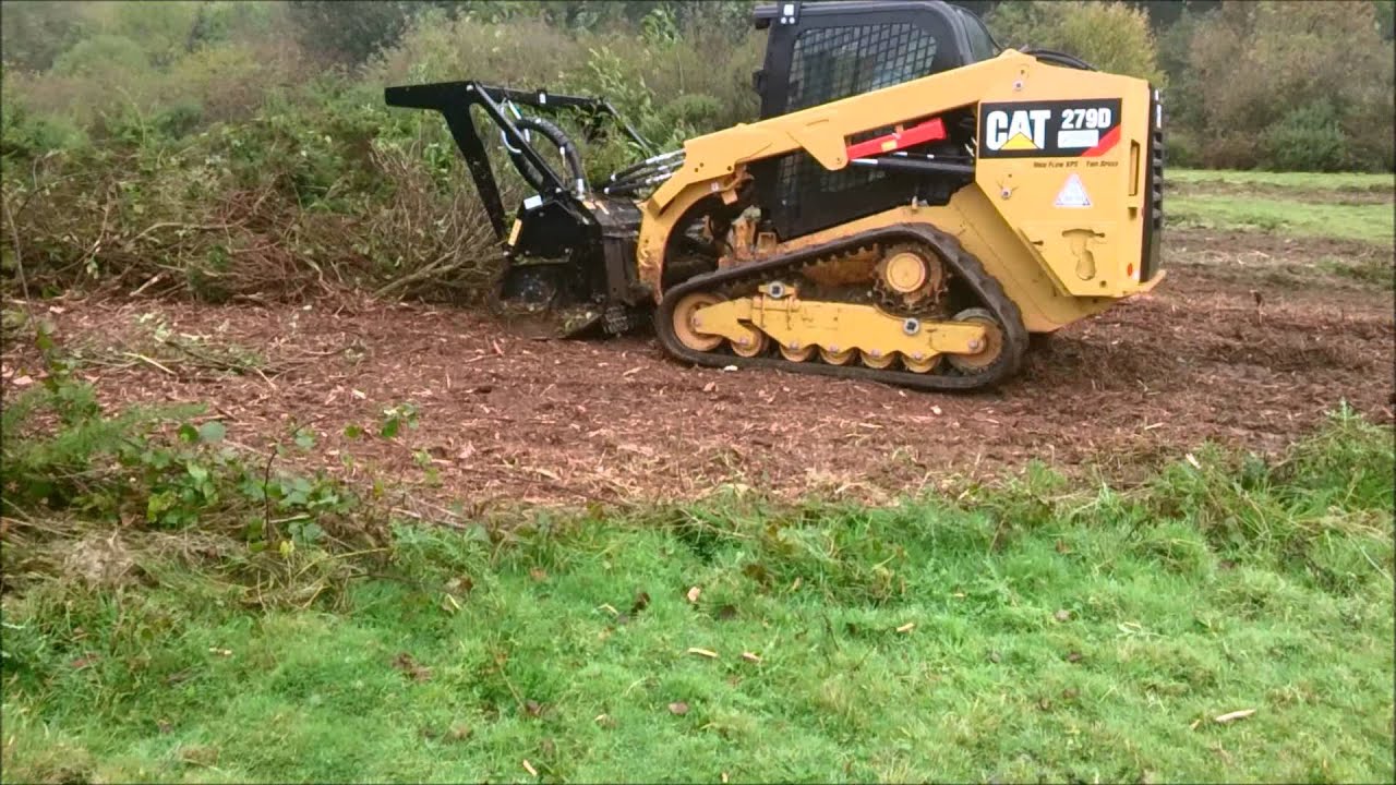 Cat 279D and HM315B Mulching head