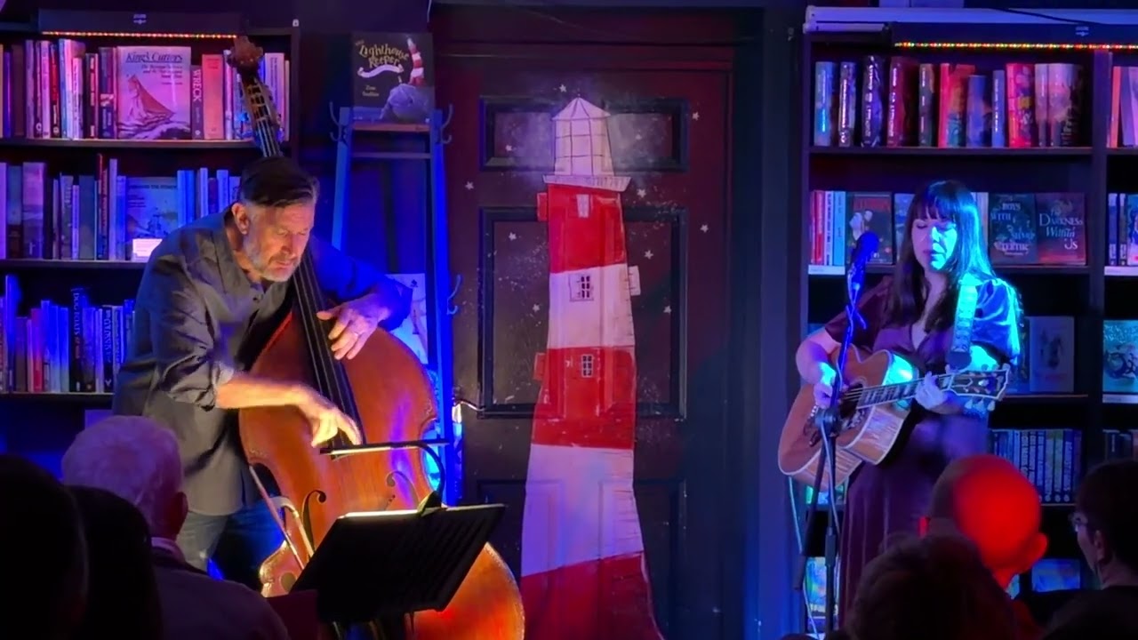 Lucy Kitchen is a British folk singer-songwriter plays at Medina Bookshop. Cowes. Isle of Wight.