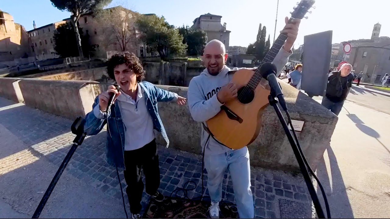 This ITALIAN Guy’s Insane Energy Singing with a Street Artist Will Blow You Away!