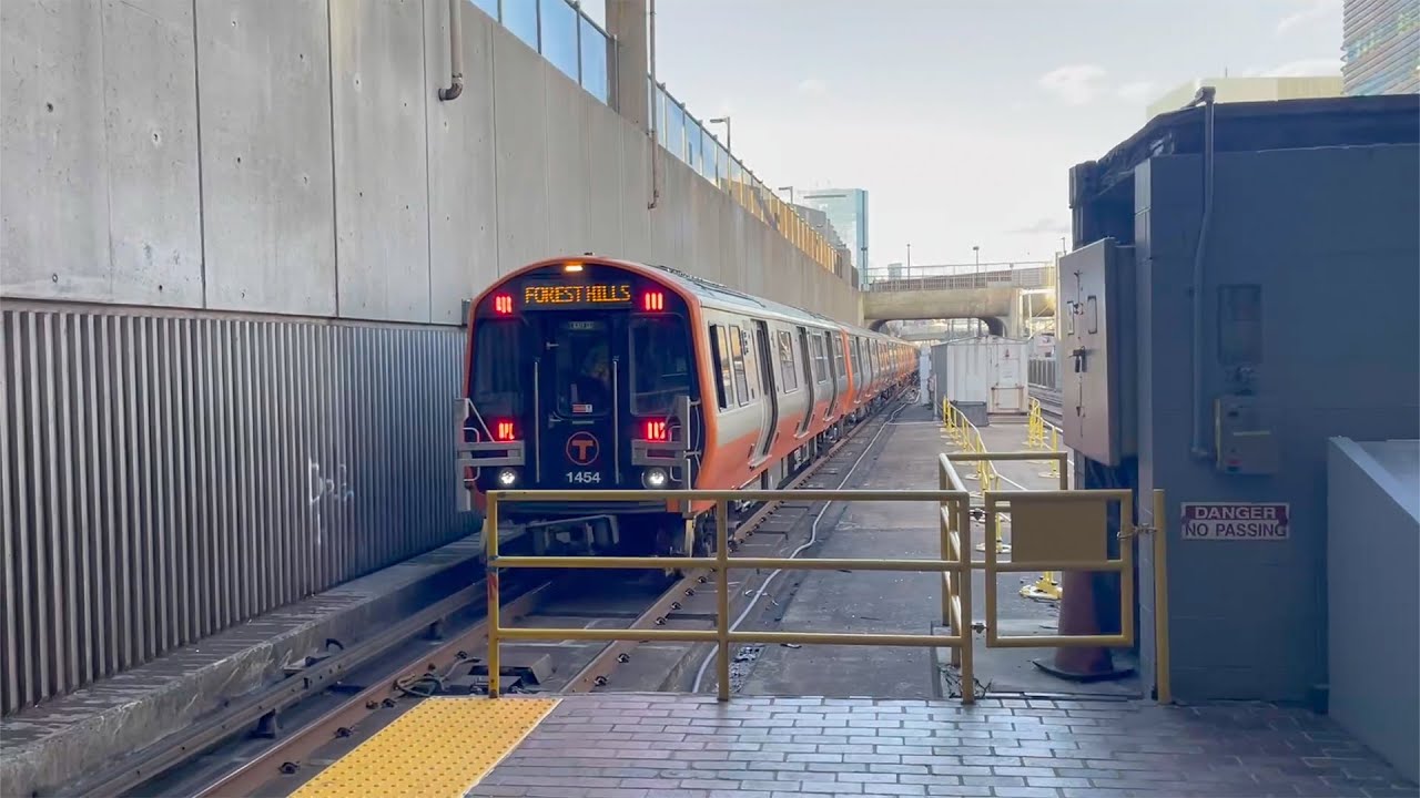 MBTA: 1400 Series Orange Line and Commuter Rail Trains at Ruggles