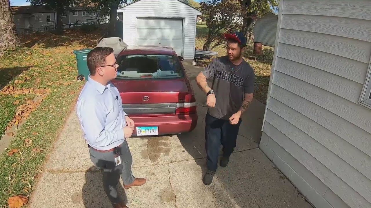 Man makes dash for it as city tries towing car with expired tags