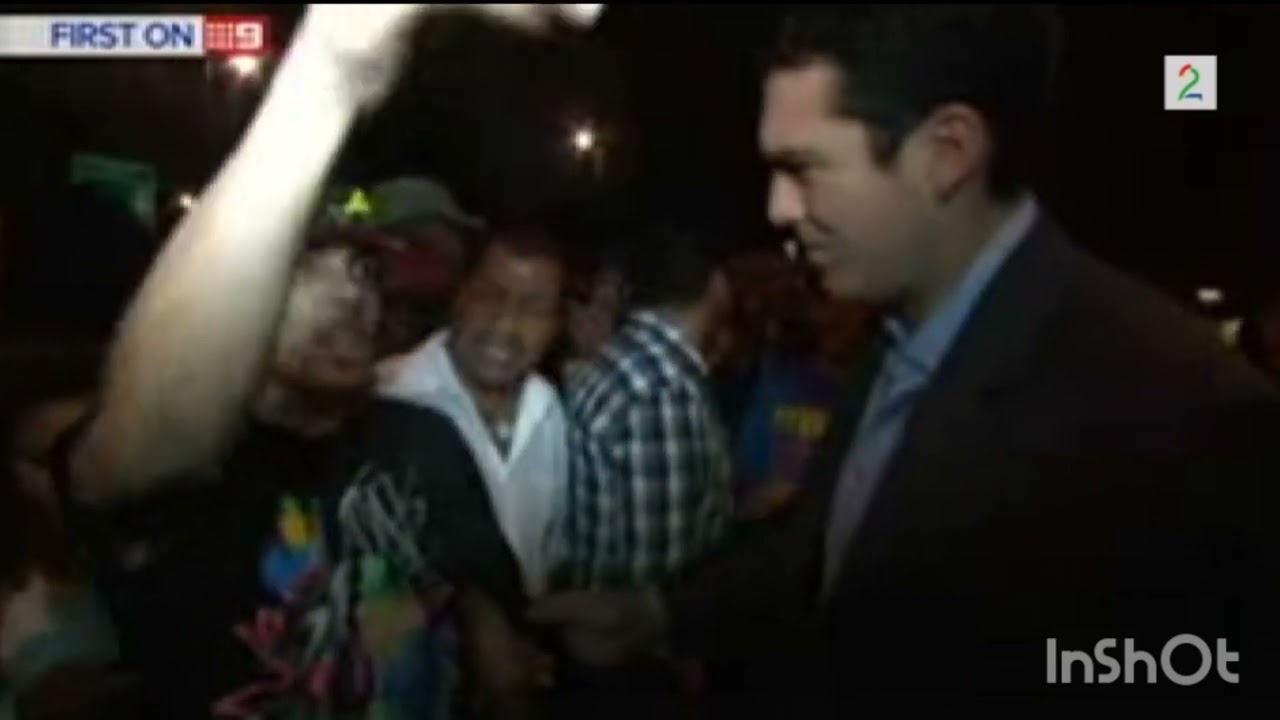 UK rapper Abdel-Majed Abdel Bary (L Jinny) shouts at the Australian Channel Nine reporter (Archive)