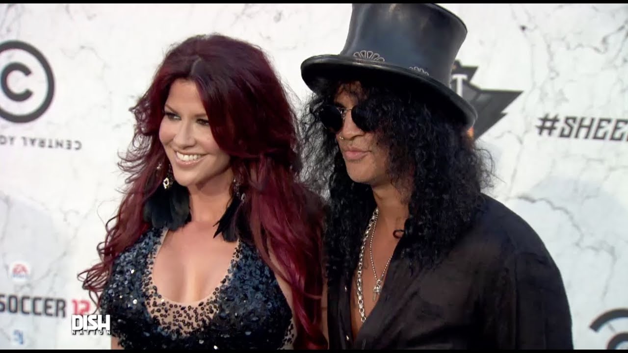 SLASH'S ESTRANGED WIFE ACCUSES HIS NEW GIRLFRIEND OF TROLLING