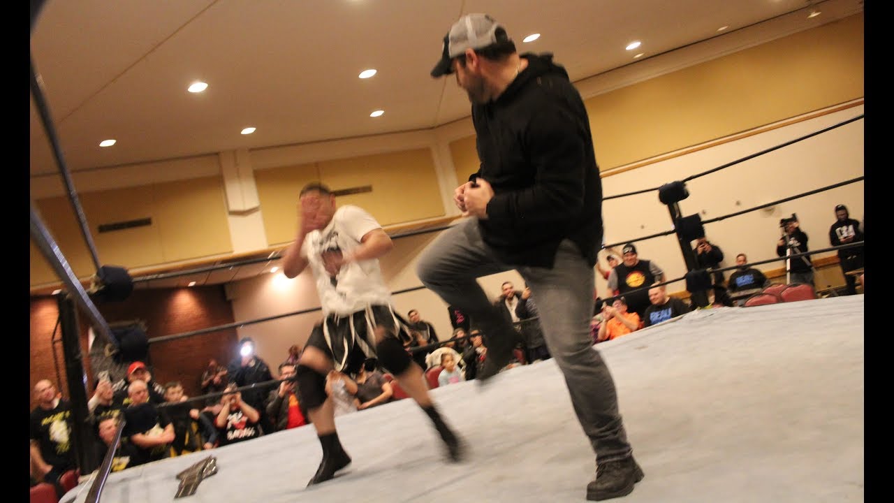 Red Power Ranger AUSTIN ST JOHN confronts pro wrestler Benny Jux in BOSTON