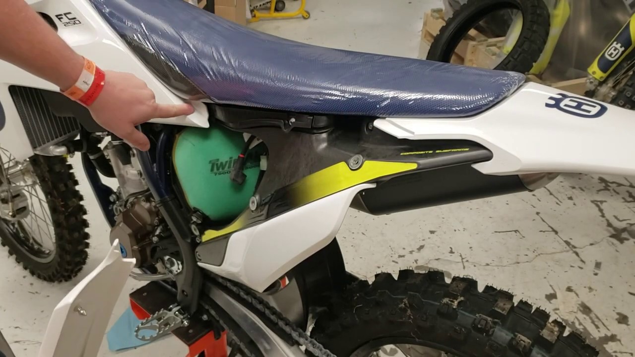 How to remove the side plate and seat on a 16-19 Husqvarna motorcycle