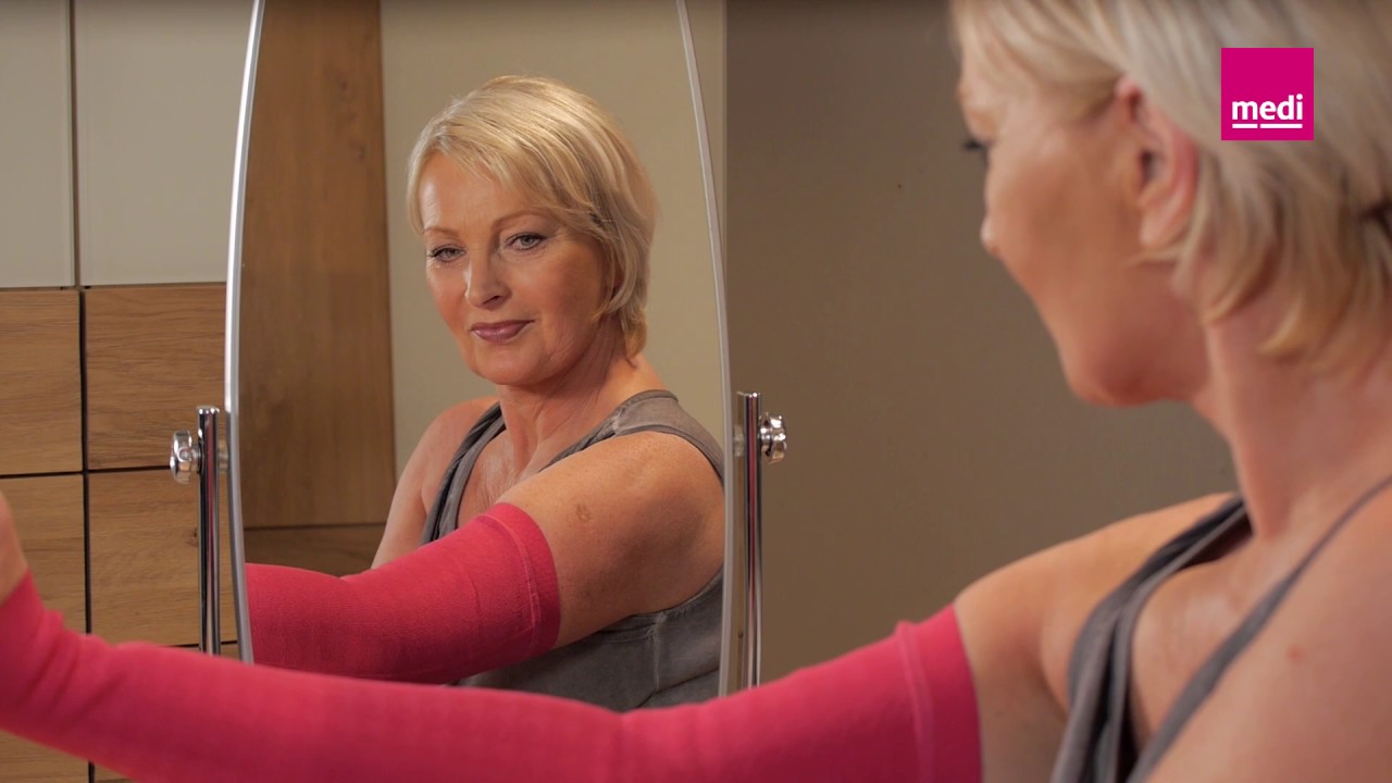 Donning flat knit arm sleeves with the medi arm butler