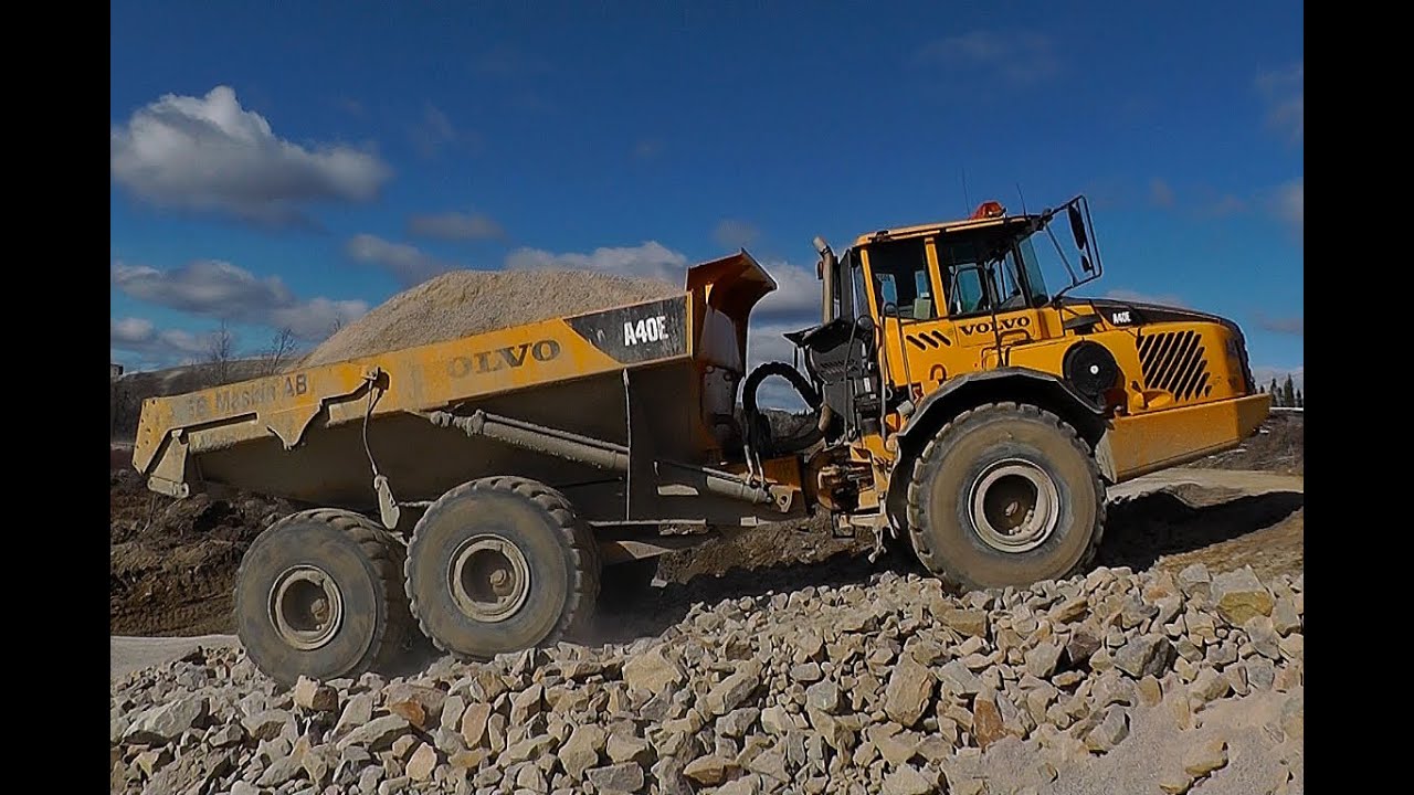 Volvo A40E & CAT 740 & Volvo A40E Tipping