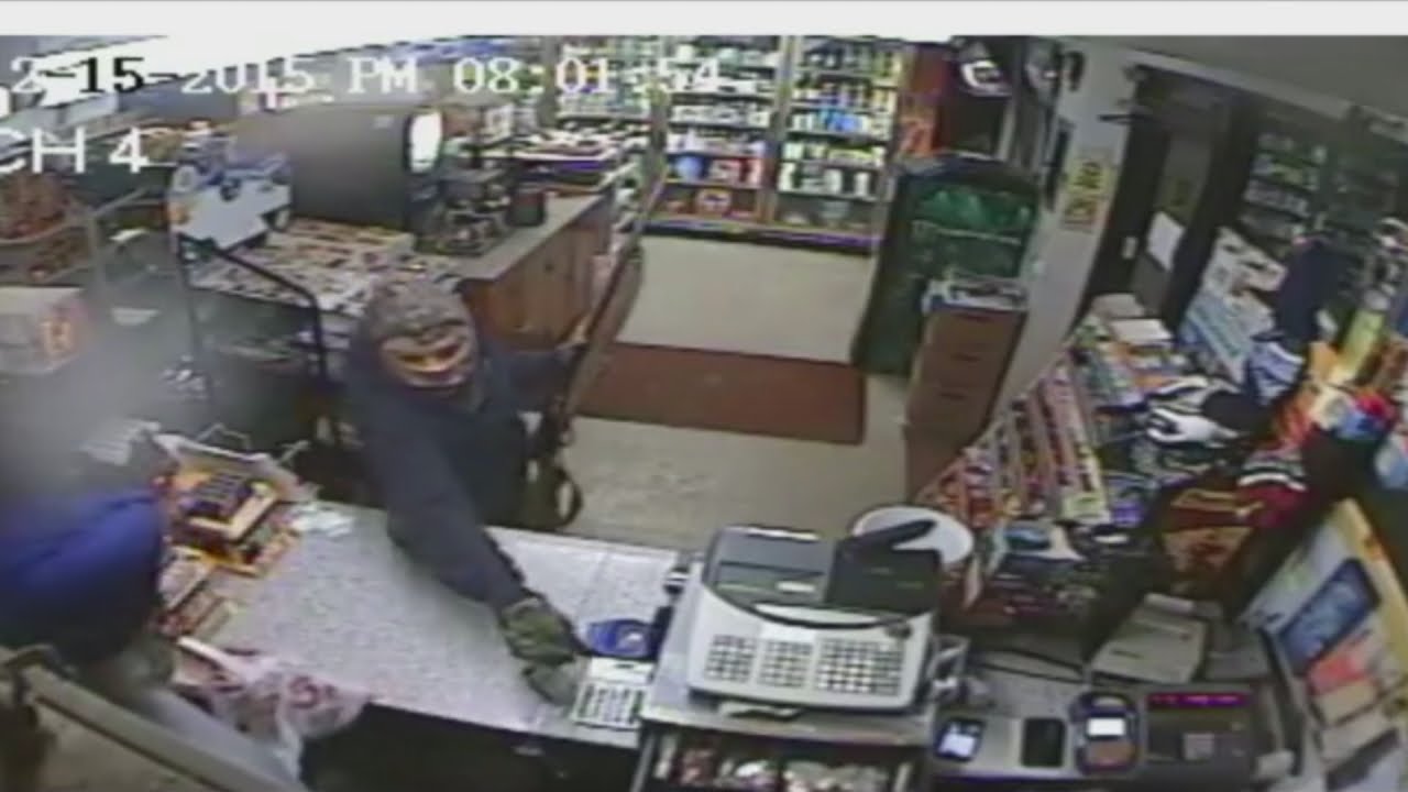 Shop worker fights off armed robber - with his shoe!