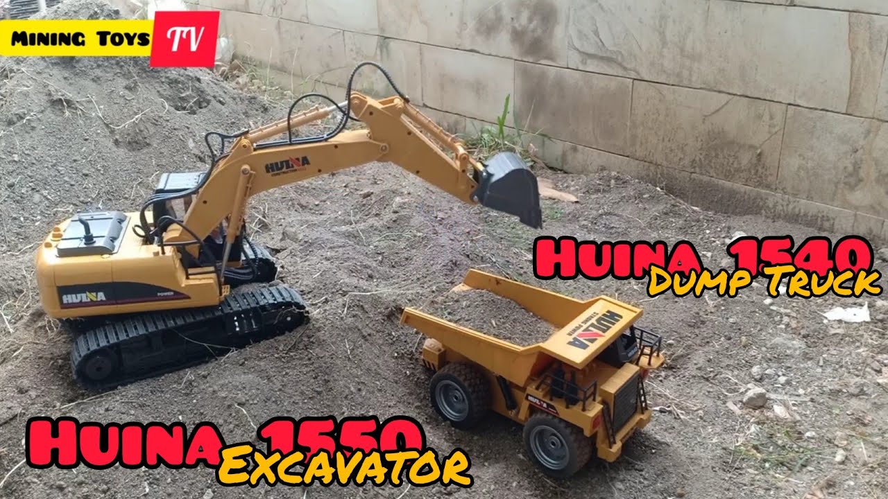 Huina 1550 excavator Helps Dredge Sand to Dump Truck Huina 1540