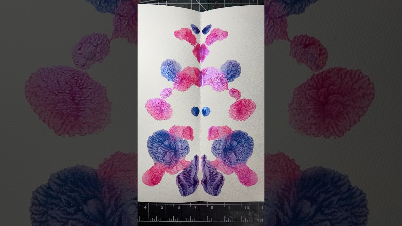 What do you see in this purple and pink ink blot? #inkblot #ink #drawing #shorts #art