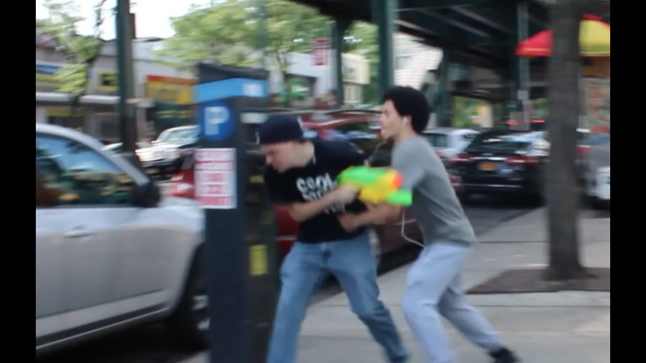 Spraying Water Gun In The Hood PRANK GONE WRONG