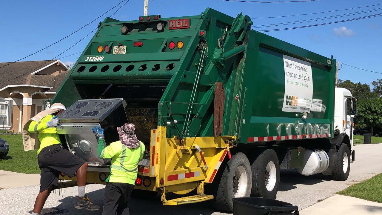 Waste Management Pete 320 Heil Rear Loader Garbage Truck Packing A Stove