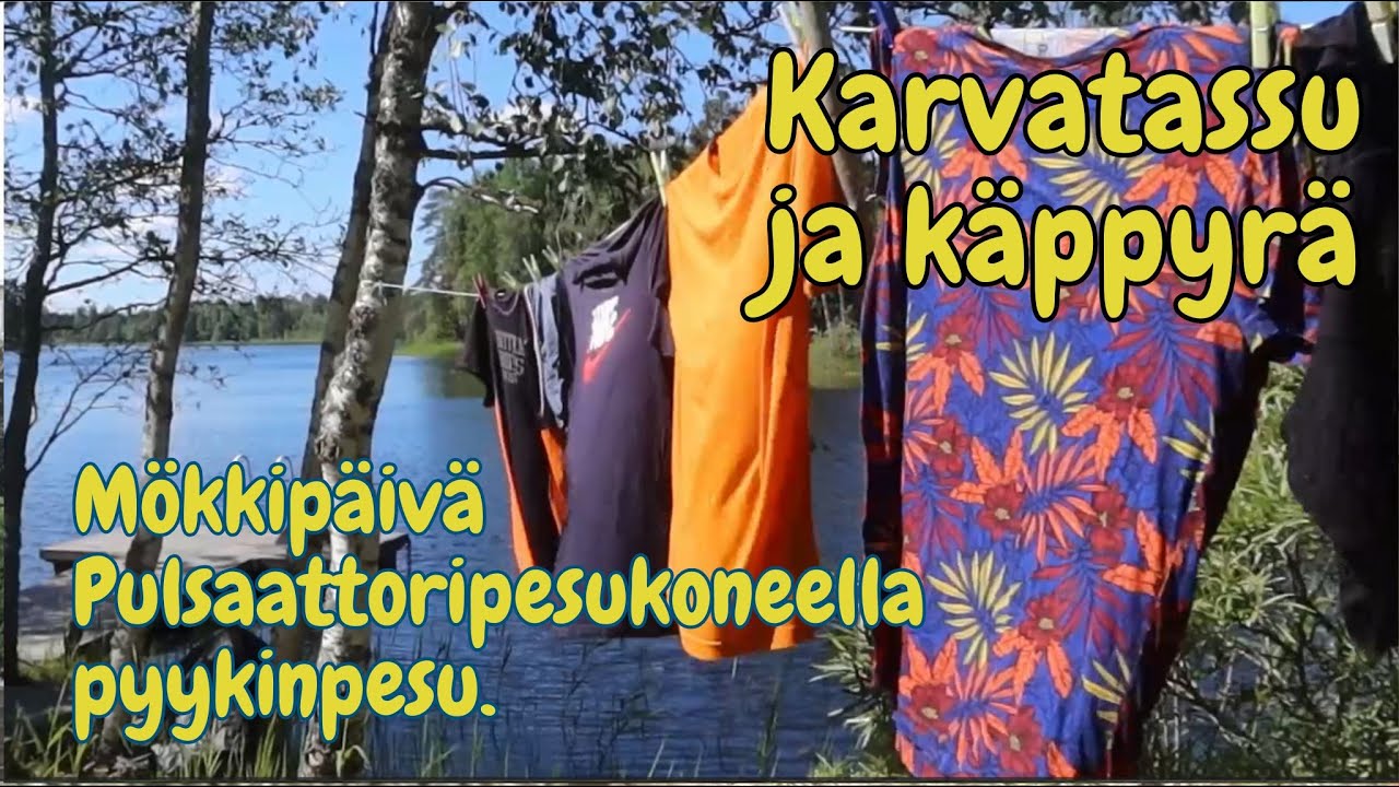 Pulsaattoripesukoneella pyykinpesu . Mökkipäivä