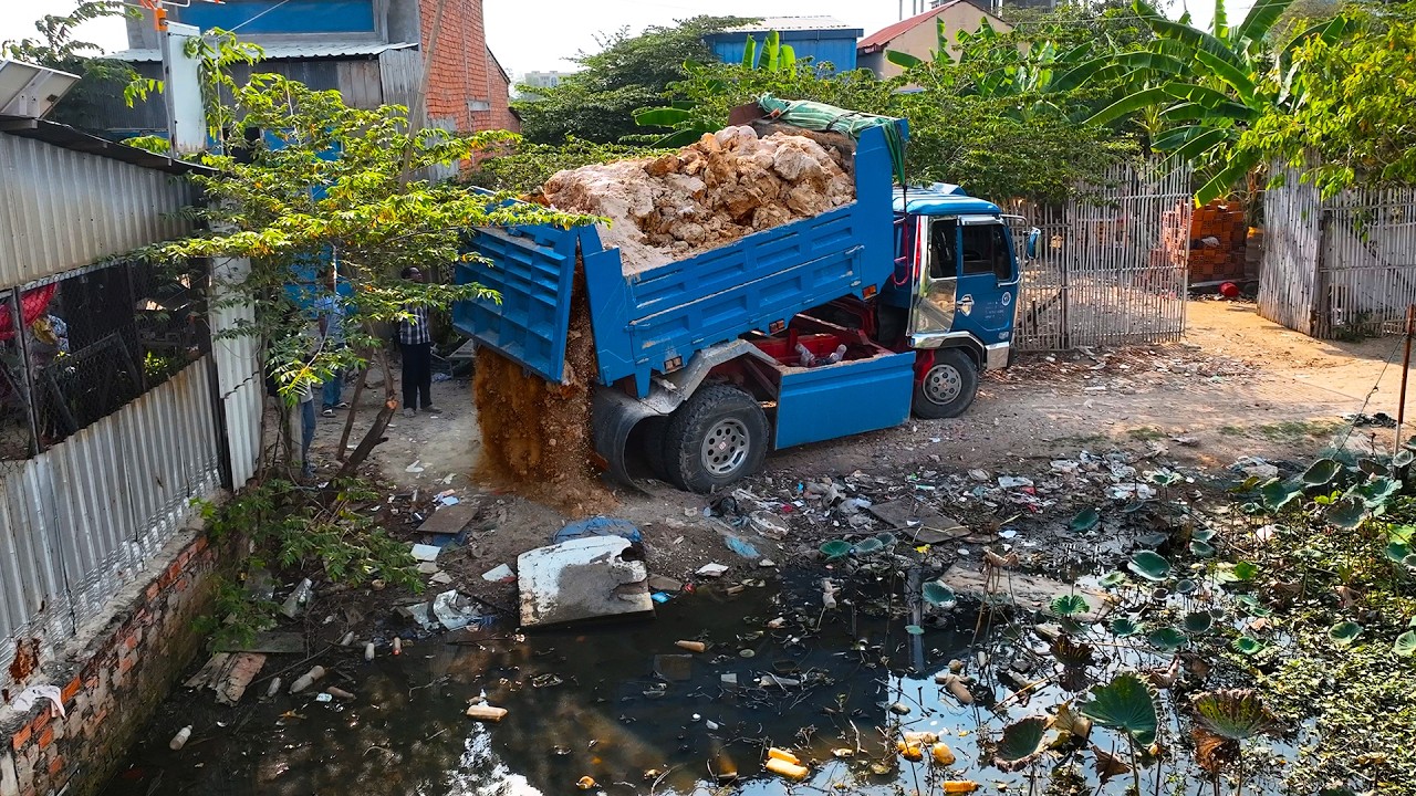 First Opening a New Project! Landfill On Flooded Pond Using Dozer D20A Pushing RockSoil with Trucks
