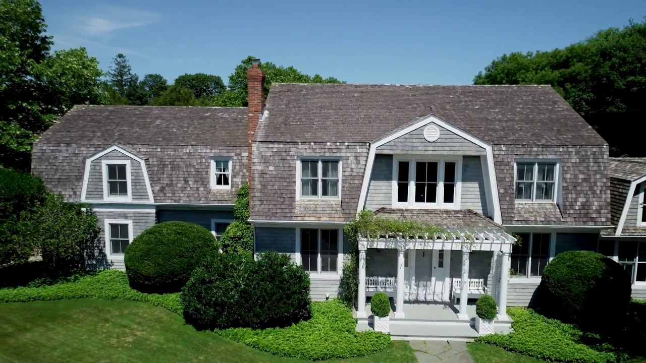 Timeless Elegance: A Traditional Hamptons Home with Luxurious Pool and Design