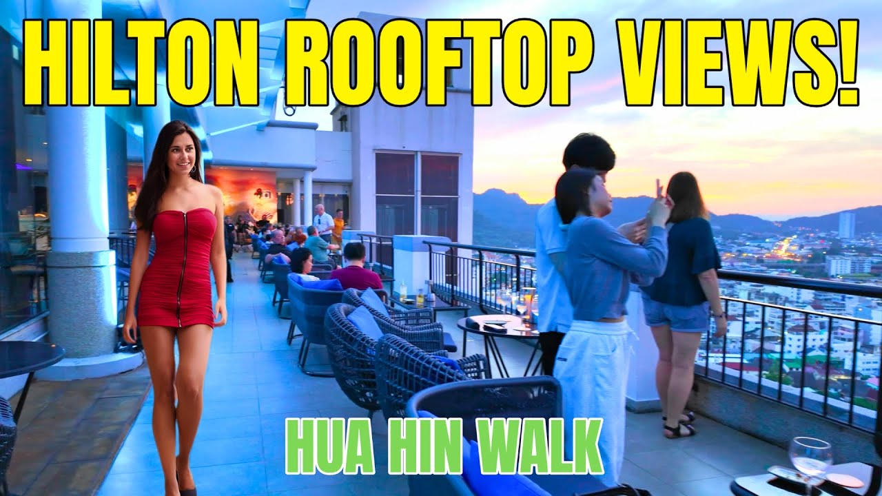 Вид на закат над баром на крыше отеля Hua Hin Hilton.