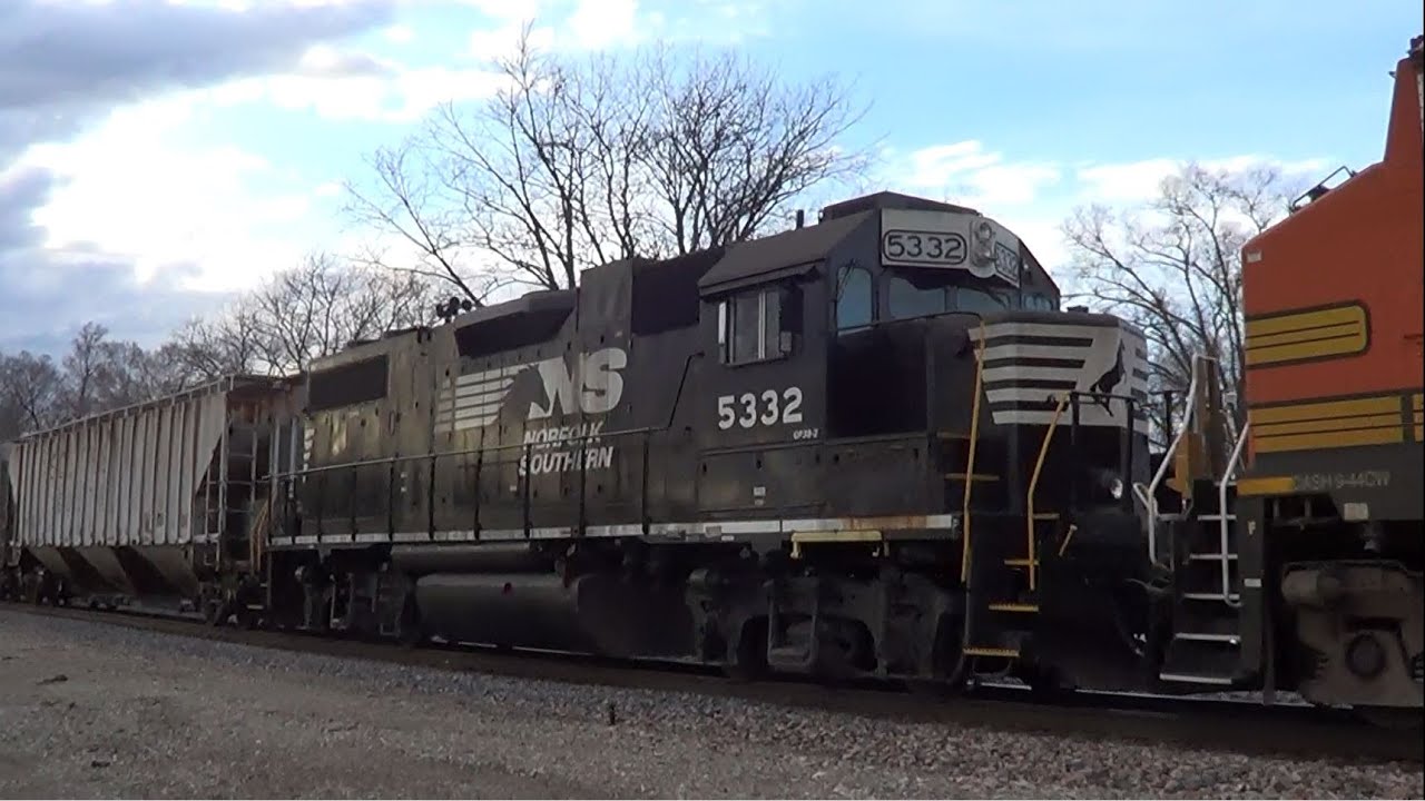 NS Geep on BNSF Mixed Freight Train
