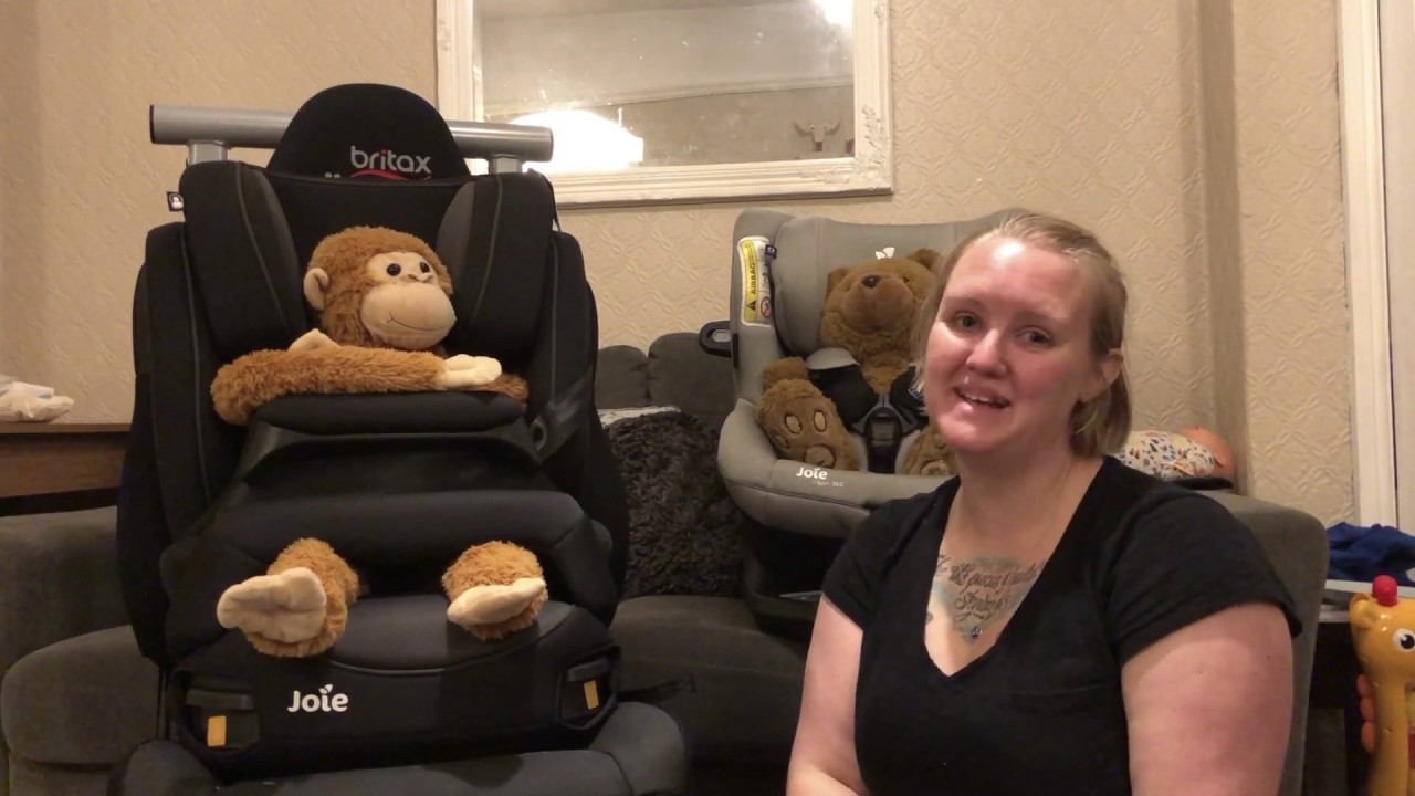 What can you do to stop your child getting their arms out of the car seat straps?
