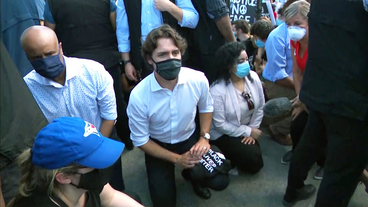 'An empty symbolic gesture': activist on Trudeau kneeling at protest