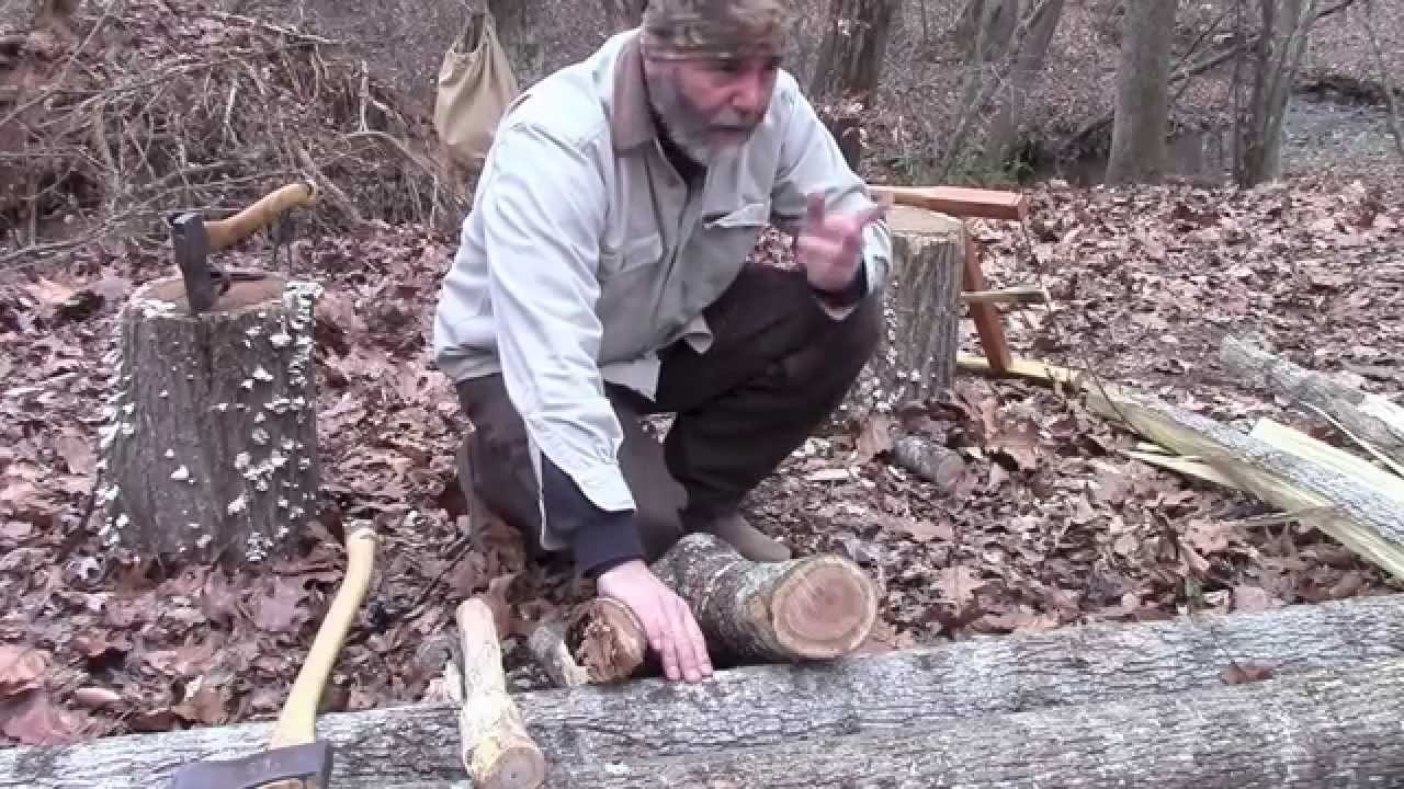 Splitting Long Logs with an Ax and Wooden Wedges