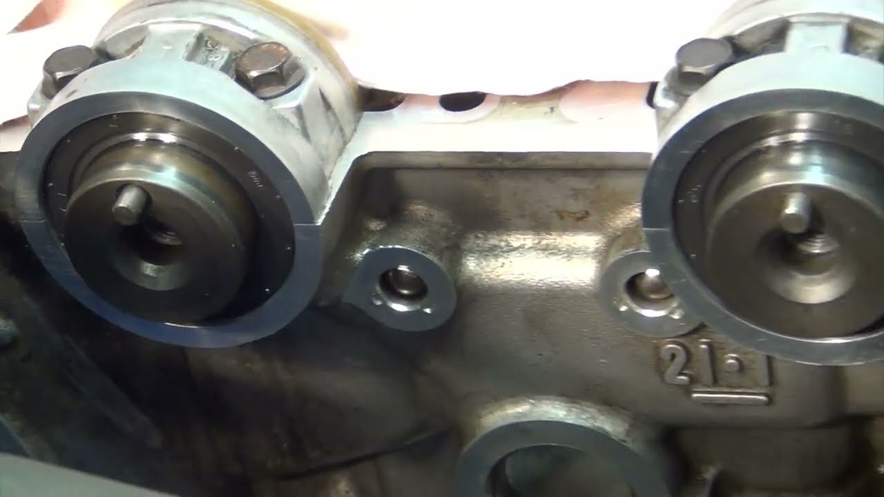 How to change camshaft oil seal 2002 Mazda Protege 2.0L