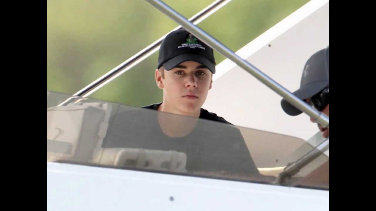 Justin Bieber fishing with Selena Gomez in Florida. (New Tattoo) (March 11 2012)