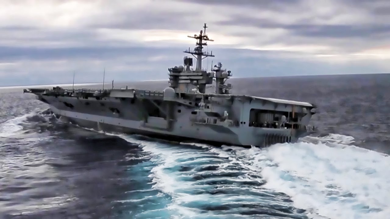 U.S. Navy Aircraft Carrier Performs High Speed Turns