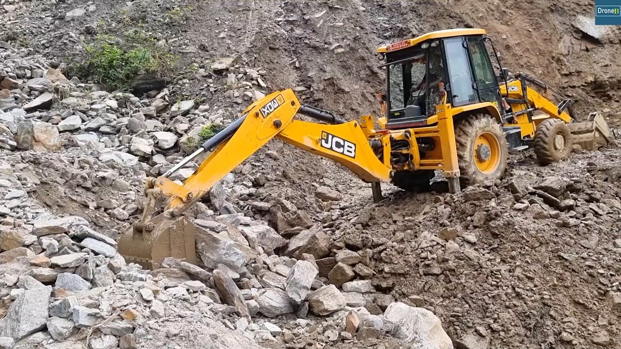 Extreme Stone Slide Removing to Join Two Hills with JCB Backhoe