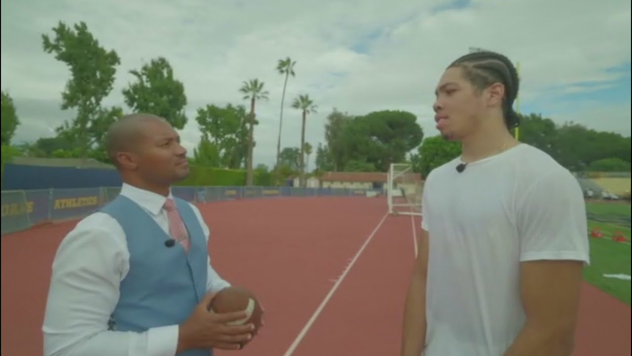 Number one ranked high school basketball recruit trying his skills on the gridiron