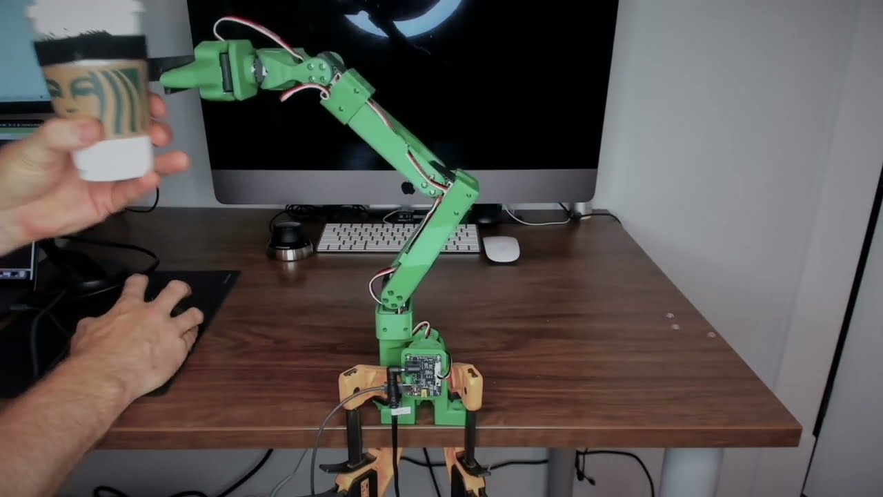 Controlling a robot arm via Onshape's API - watch it try and grab my coffee!
