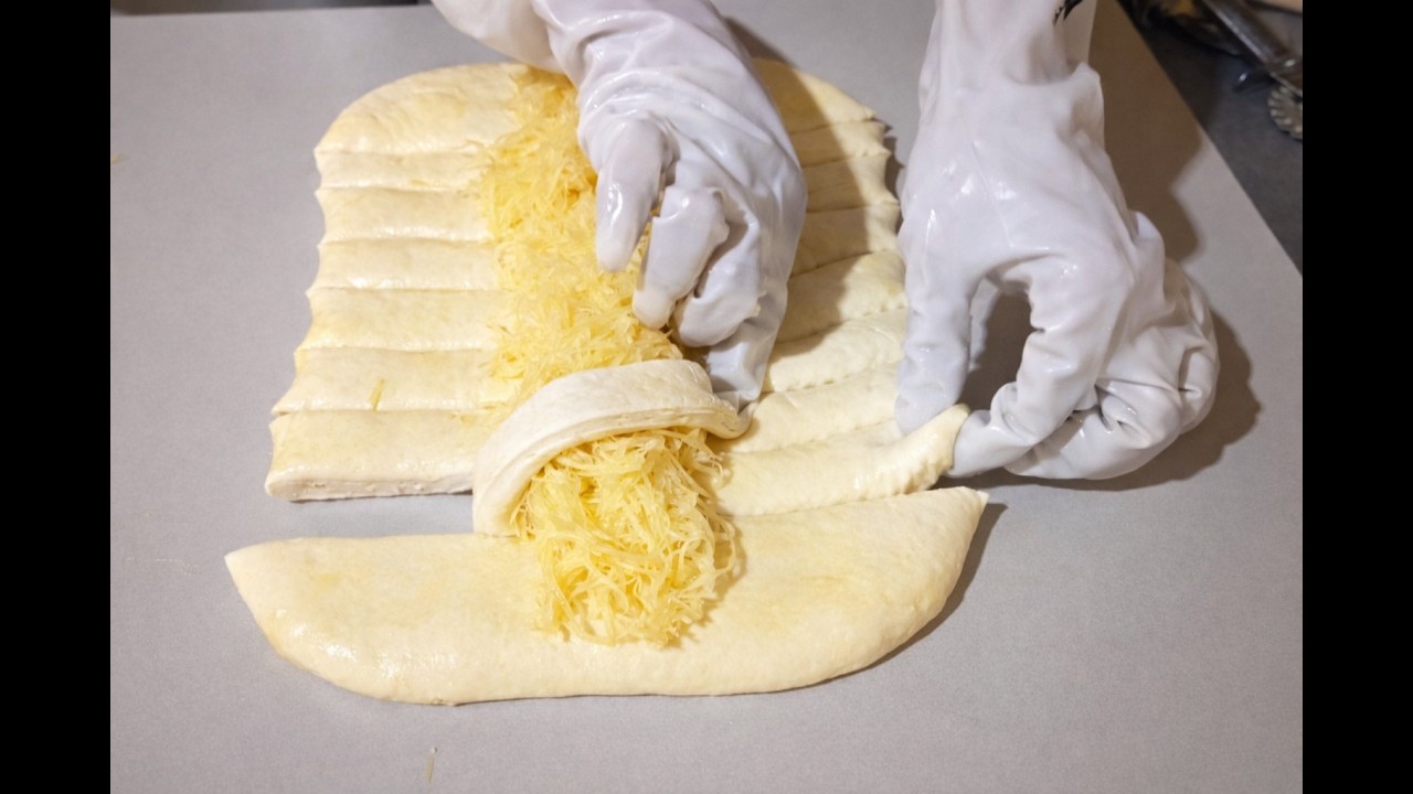 Very professional cheese braid bread making #bakeryowner