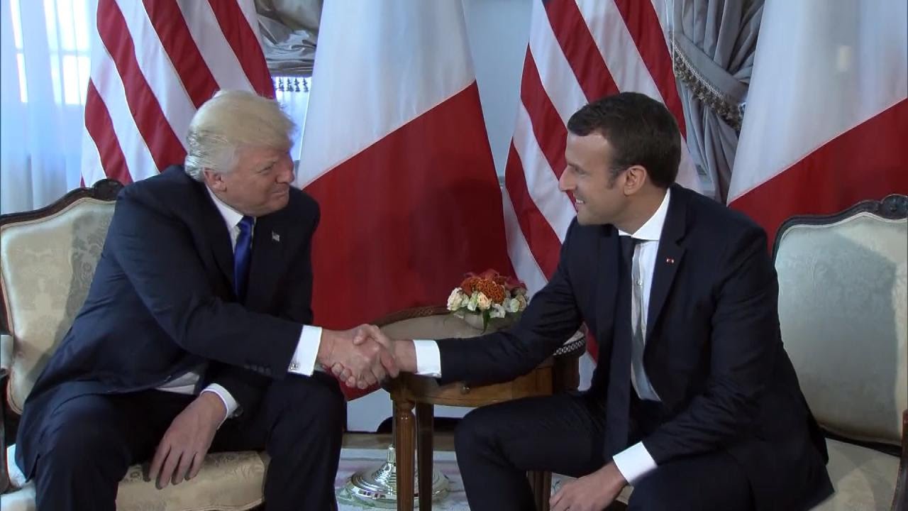 See President Trump and French President's Epic White Knuckle Handshake