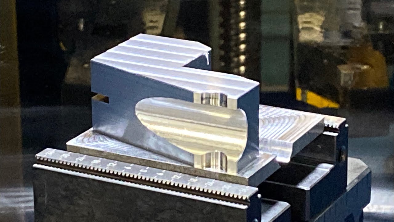 MAM72-35V 5 axis machining alloy steel, was 5 VMC ops now it's 2!  98% green light time! Watch in 4K