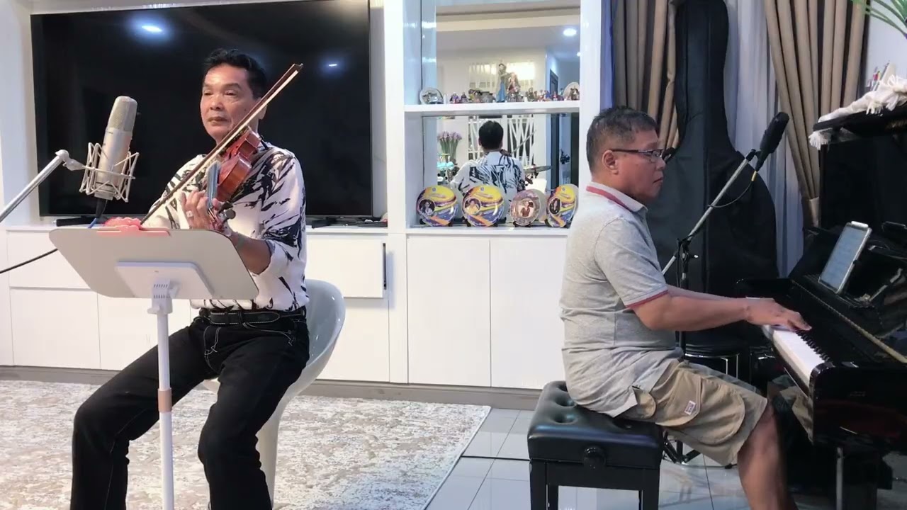 ស្រីដែលក្បត់ចិត្ត Cover ដោយលោកគ្រូចេវ  & លោកគ្រូ ឡោ ណែត Violin & Piano 