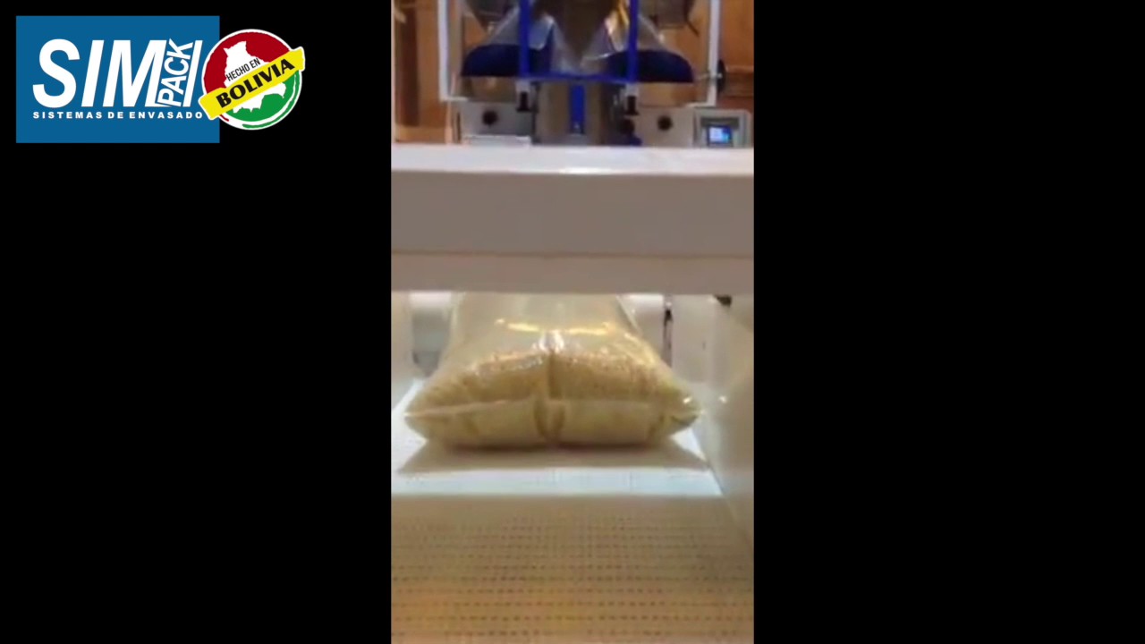 Envasadora SIMPACK ALM-450-V envasando quinoa insuflada