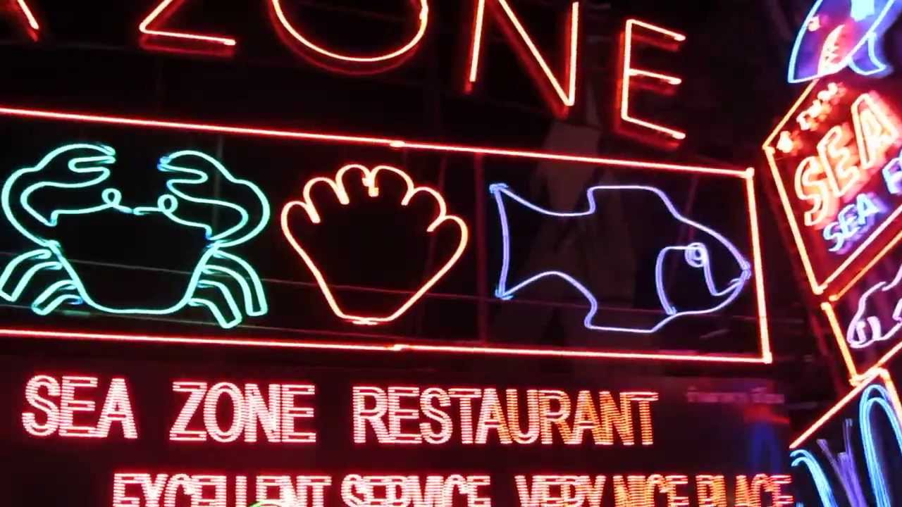 Neon signs in Walking Street in Pattaya City , Thailand