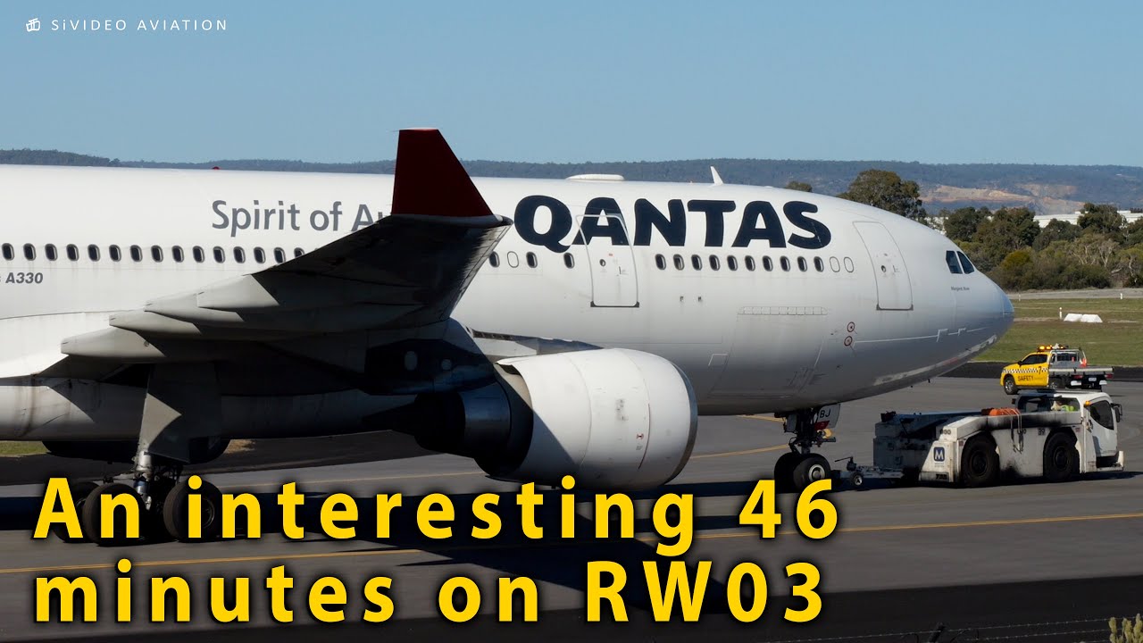 Qantas A330 is towed via A11 for engine run, causes a B737 go around & 10 other aircraft movements.