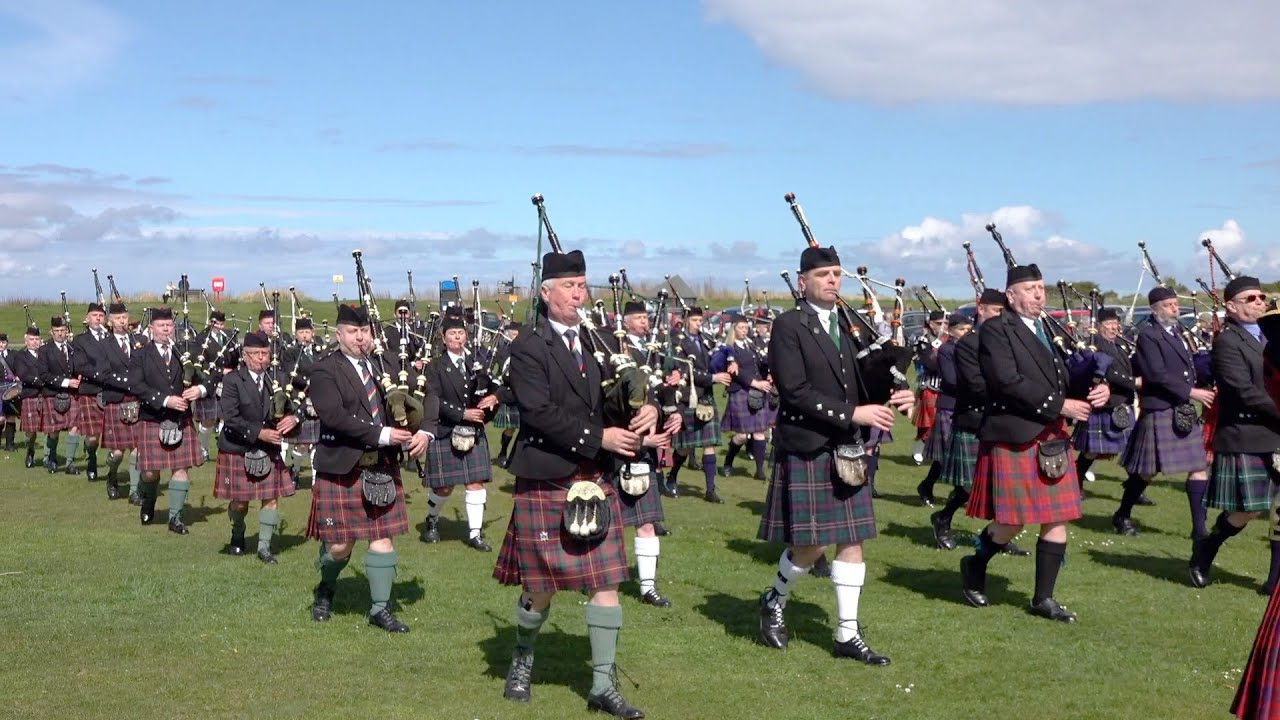 Massed Highland Pipe Bands playing 
