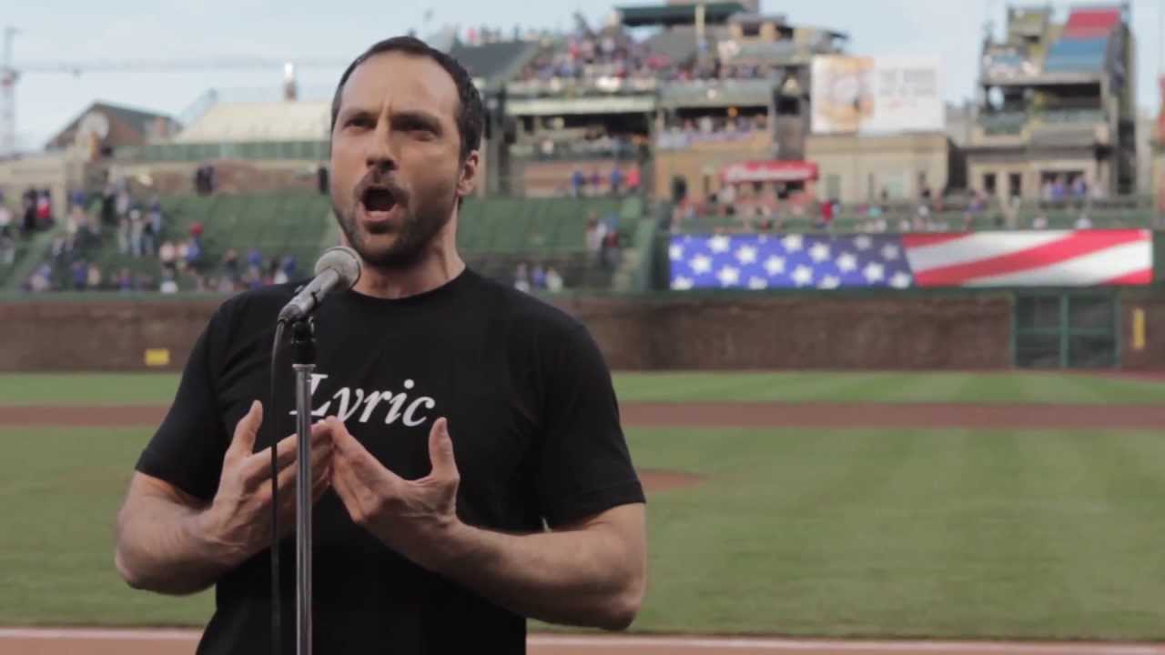 OKLAHOMA!'s David Adam Moore sings the National Anthem at Chicago Cubs game