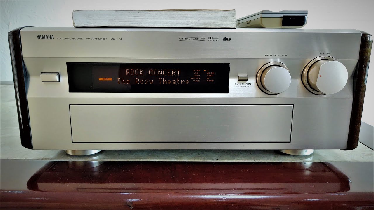A small test of the Yamaha DSP-A1 amplifier - export model, champagne color with wooden sides.