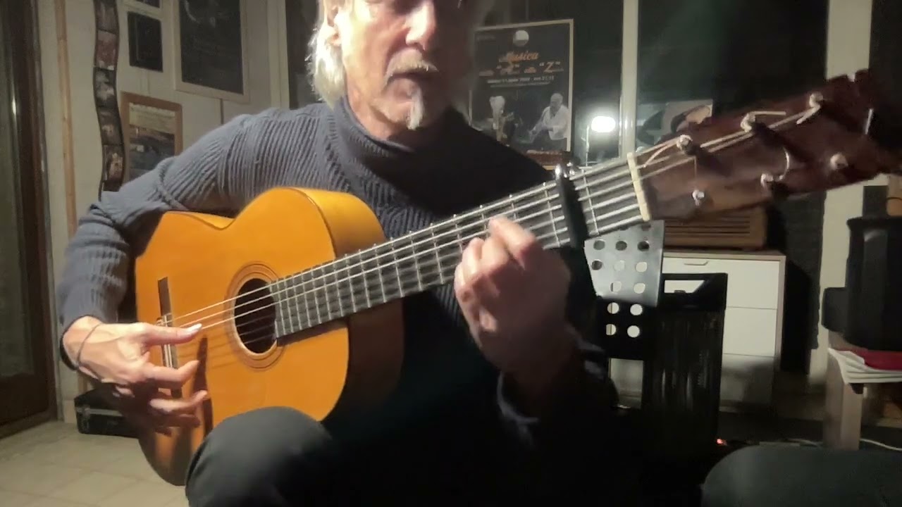 Alzap&ugrave;a por Tangos on a Faustino Conde Guitar of 51 years