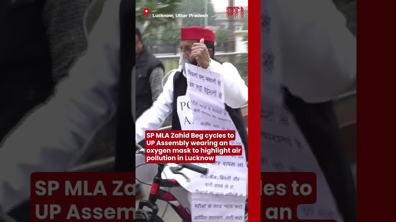 SP MLA Zahid Beg cycles to UP Assembly wearing an oxygen mask to highlight air pollution in Lucknow