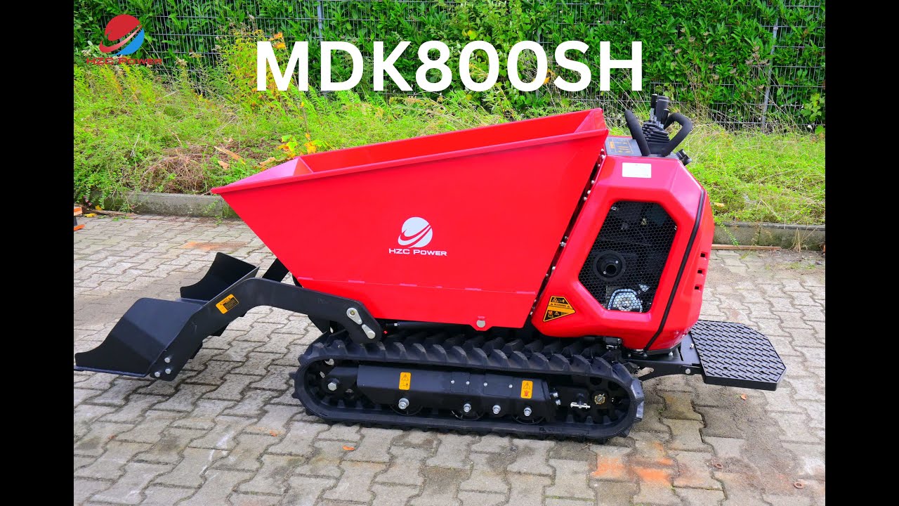 Der MDK800SH – Kettenantrieb, hydraulische Selbstladeschaufel und Fahrerplattform