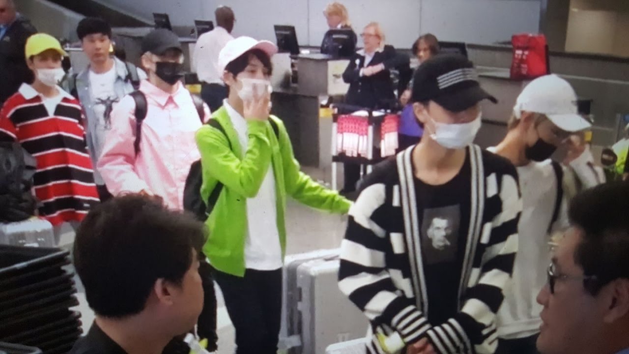 K POP NCT 127 and fans at Los Angeles International Airport